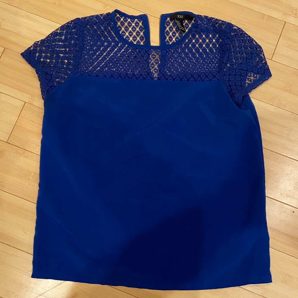 blue blouse with lace shoulders